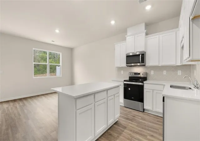 Photo 3 of Sale Pending at 2054 Crossing Rd, Stone Mountain, GA 30088 | MLS# 7781646 | Listing updated on 2026-09-11