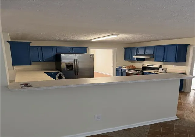 Photo 2 of Single family home for sale at 7938 Palomino Pass, Riverdale, GA 30274 | MLS# 7826104 | Listing updated on 2026-08-25