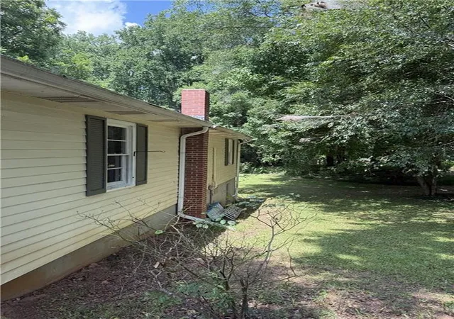 Photo 3 of Single family home for sale at 2497 Brick Ml Rd, Canton, GA 30115 | MLS# 7817728 | Listing updated on 2026-09-11