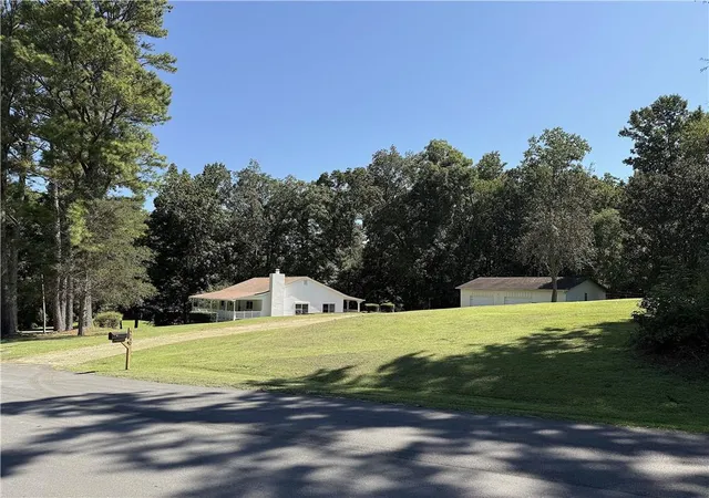 Photo 2 of Single family home for sale at 5730 Westwood Dr, Cumming, GA 30040 | MLS# 7826047 | Listing updated on 2026-09-07