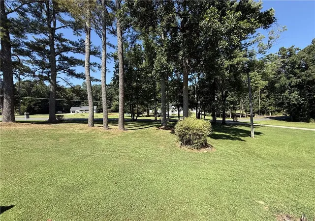 Photo 2 of Single family home for sale at 5730 Westwood Dr, Cumming, GA 30040 | MLS# 7826047 | Listing updated on 2026-09-07