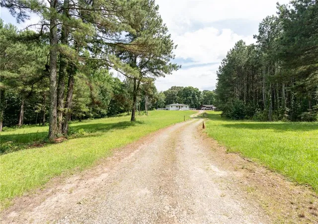 Photo 1 of Single family home for sale at 1585 Jimmy Dodd Rd, Buford, GA 30518 | MLS# 7798814 | Listing updated on 2026-09-30