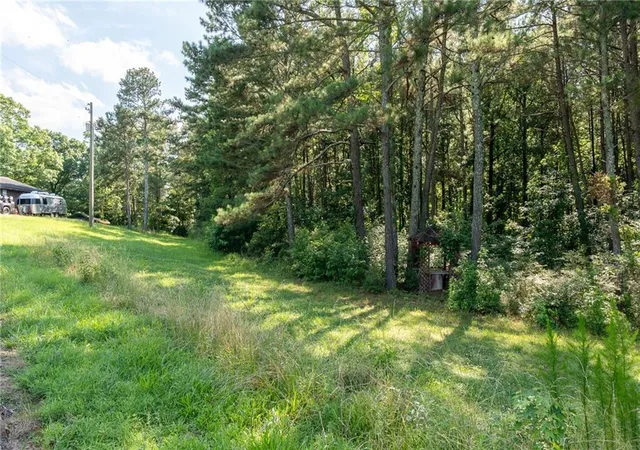 Photo 3 of Single family home for sale at 1585 Jimmy Dodd Rd, Buford, GA 30518 | MLS# 7798814 | Listing updated on 2026-09-30