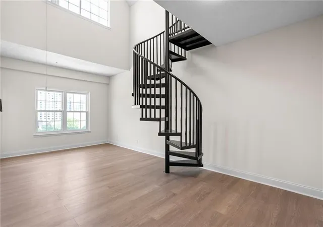 Listing Photo 1 - Condo for sale in building located at 1075 Peachtree Walk Ne, Atlanta, GA 30309 - Unit #A519