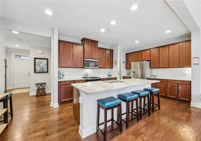 Photo 3 of Townhouse for sale at 8630 Gladden Ln, Suwanee, GA 30024 | MLS# 7817761 | Listing updated on 2026-10-17