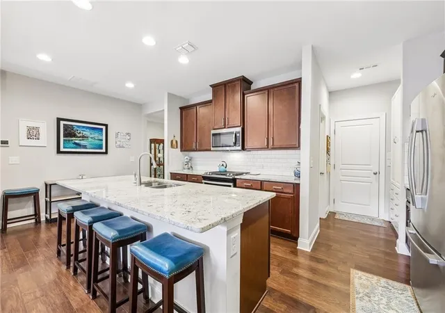 Photo 4 of Townhouse for sale at 8630 Gladden Ln, Suwanee, GA 30024 | MLS# 7817761 | Listing updated on 2026-10-17
