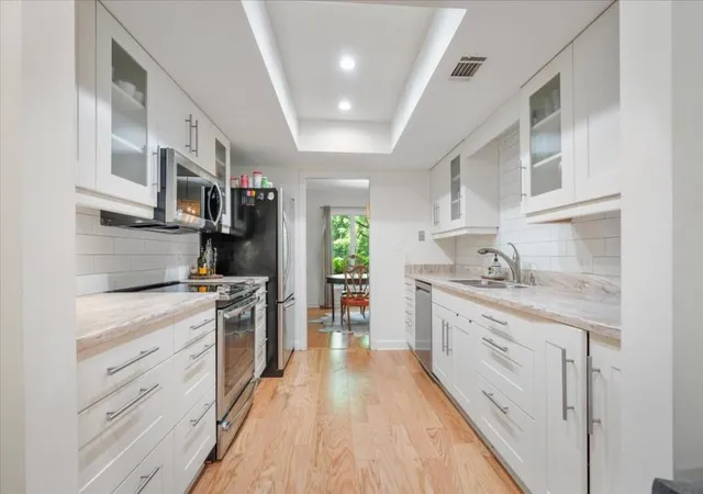 Photo 2 of Townhouse for sale at 47 Ivy Trl Ne, Atlanta, GA 30342 | MLS# 7794544 | Listing updated on 2026-09-18