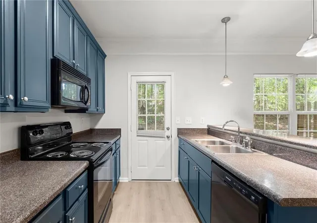 Photo 4 of Sale Pending at 5016 Lower Elm St, Atlanta, GA 30349 | MLS# 7823924 | Listing updated on 2026-09-05
