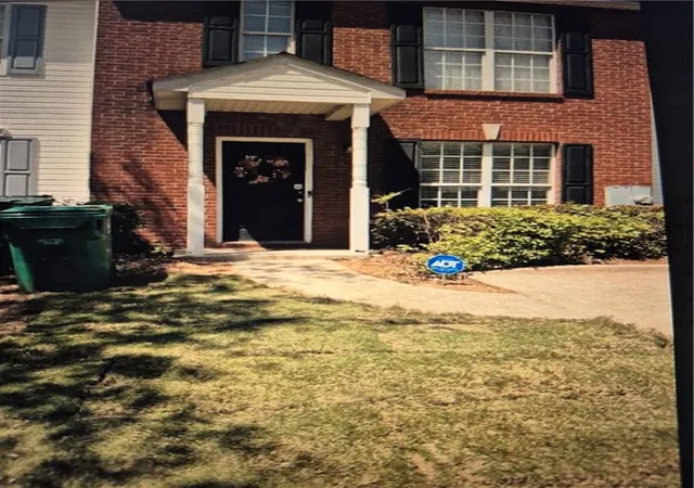 Photo 1 of Townhouse for sale at 2289 Strathmoor Manor Dr, Lithonia, GA 30058 | MLS# 7593818 | Listing updated on 2026-09-16