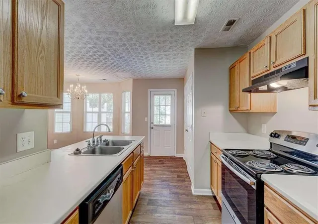 Photo 3 of Townhouse for sale at 2289 Strathmoor Manor Dr, Lithonia, GA 30058 | MLS# 7593818 | Listing updated on 2026-09-16