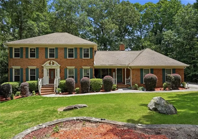 1st image of 5027 Castlewood Dr Sw, Lilburn, GA 30047 | MLS# 7822253