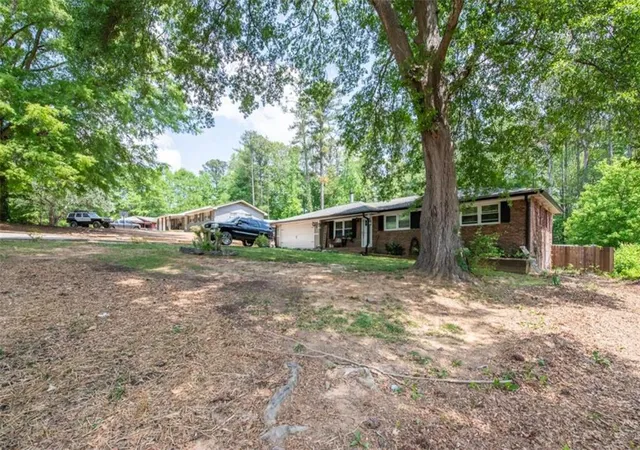 Photo 2 of Single family home for sale at 303 Wildwood Dr, Dallas, GA 30132 | MLS# 7787663 | Listing updated on 2026-06-13