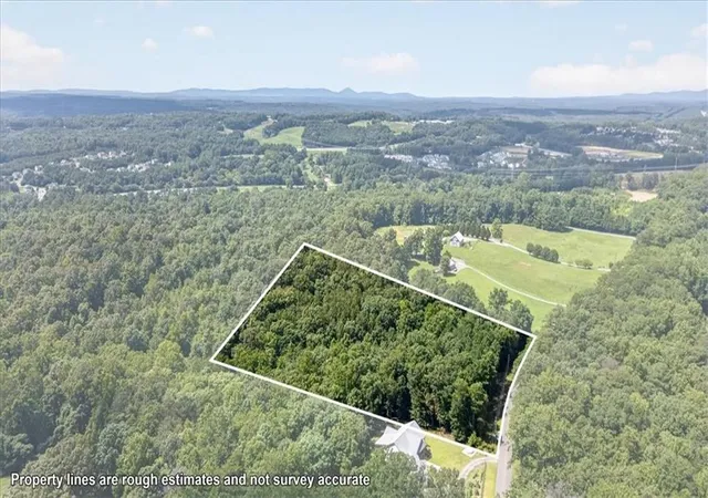 Photo 3 of Land for sale at 0a Flat Btm Rd, Ball Ground, GA 30107 | MLS# 7820080 | Listing updated on 2026-08-14