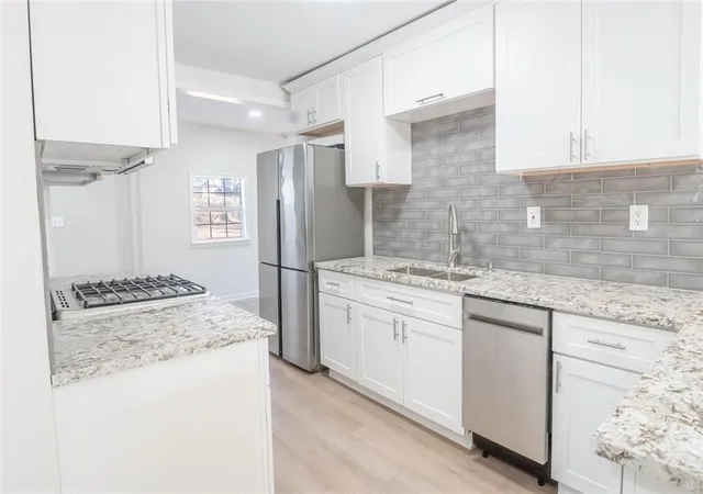 Photo 3 of Single family home for sale at 1751 S Olympian Way SW, Atlanta, GA 30310 | MLS# 7725970 | Listing updated on 2026-08-25