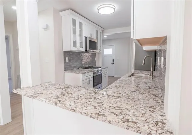 Photo 4 of Single family home for sale at 1751 S Olympian Way SW, Atlanta, GA 30310 | MLS# 7725970 | Listing updated on 2026-08-25