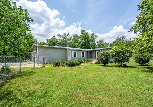 1st image of 1054 Booze Mountain Rd, Lindale, GA 30147 | MLS# 7800145