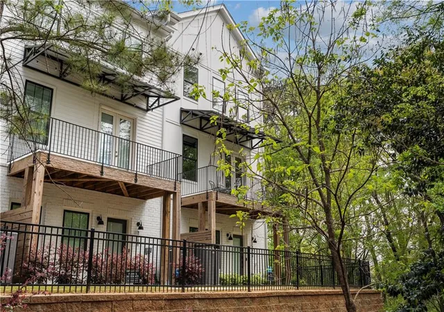 Photo 1 of Townhouse for sale at 2004 Oak Ln Nw, Atlanta, GA 30318 | MLS# 7800834 | Listing updated on 2026-10-09