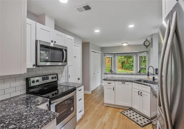 Photo 3 of Condo for sale at 6420 Windsor Tr Dr #6420, Peachtree Corners, GA 30092 | MLS# 7796191 | Listing updated on 2026-09-13