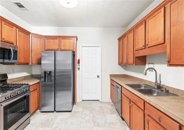 Photo 3 of Townhouse for sale at 1709 W Taylor Ave, East Point, GA 30344 | MLS# 7822016 | Listing updated on 2026-08-29