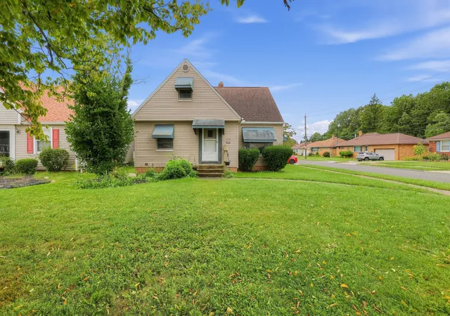 Single family home for sale at 12112 Thraves Ave, Cleveland, OH 44125 | MLS# 226037447