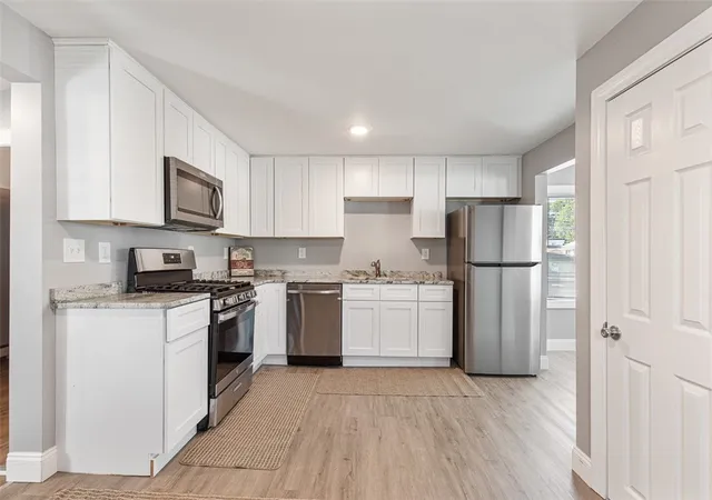 Photo 3 of Single Family Residence at 90 Huron St, Warwick, RI 02889 | MLS# 1394863 |  | Sold on 2025-10-30