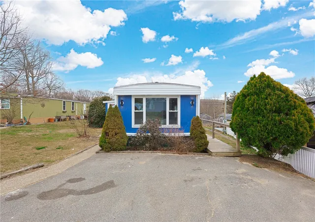 Photo 2 of Single Family Residence at 301 Bulgarmarsh Rd Lot 58, Tiverton, RI 02878 | MLS# 1408742 | | Sold on 2026-04-29
