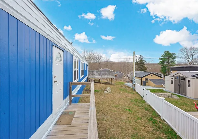 Photo 3 of Single Family Residence at 301 Bulgarmarsh Rd Lot 58, Tiverton, RI 02878 | MLS# 1408742 | | Sold on 2026-04-29