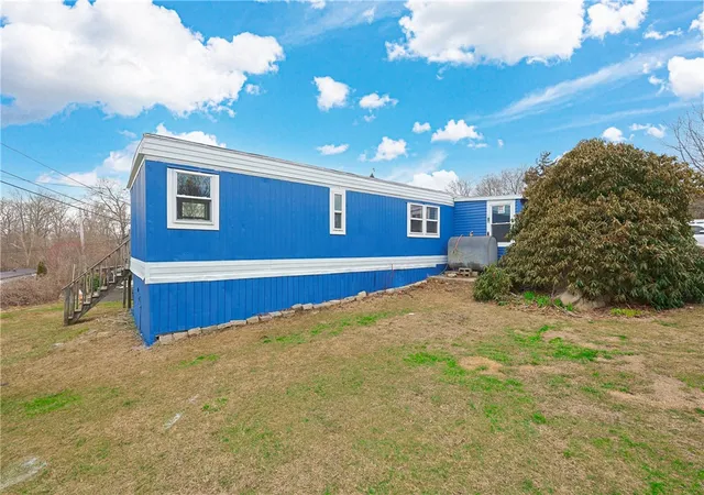 Photo 4 of Single Family Residence at 301 Bulgarmarsh Rd Lot 58, Tiverton, RI 02878 | MLS# 1408742 | | Sold on 2026-04-29