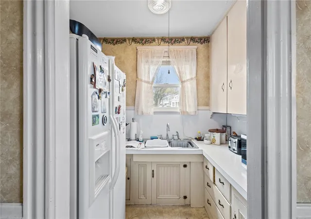 Photo 3 of Sale Pending at 303 Webster Ave, Cranston, RI 02920 | MLS# 1409178 | Listing updated on 2026-04-26