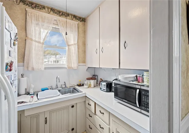 Photo 4 of Sale Pending at 303 Webster Ave, Cranston, RI 02920 | MLS# 1409178 | Listing updated on 2026-04-26