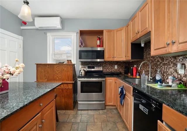 Photo 3 of Multi family home for sale at 1040 Cranston St, Cranston, RI 02920 | MLS# 1409521 | Listing updated on 2026-05-04