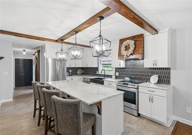 Photo 3 of Sale Pending at 880 Wood St, Swansea, MA 02777 | MLS# 1418426 | Listing updated on 2026-08-12