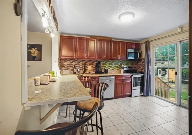 Photo 3 of Sale Pending at 14 Wilson Ave, Warwick, RI 02889 | MLS# 1418899 | Listing updated on 2026-08-15