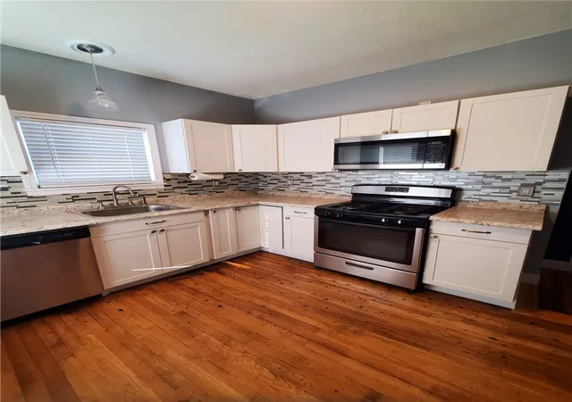 Photo 2 of Multi family home for sale at 27 Centre St, West Warwick, RI 02893 | MLS# 1420578 | Listing updated on 2026-08-31