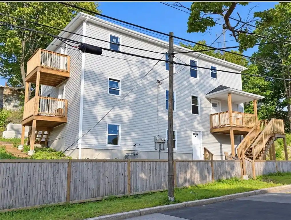 Photo 1 of Multi family home for sale at 132 Elm St, Woonsocket, RI 02895 | MLS# 1424194 | Listing updated on 2026-10-28