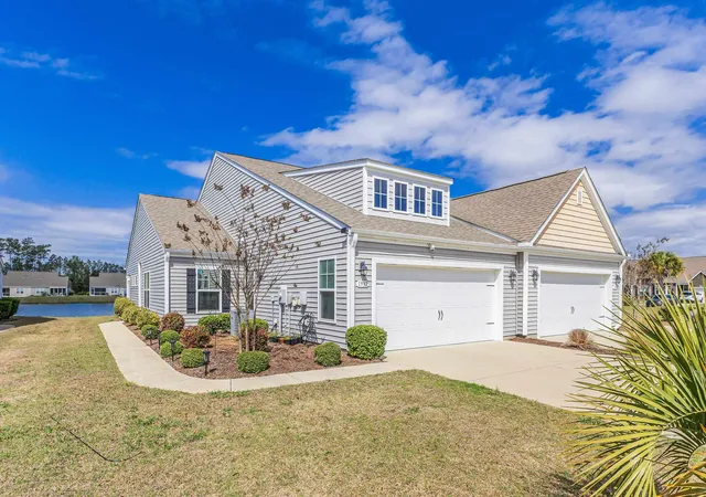 Photo 1 of Townhouse for sale at 1932 Coleman Lake Dr #1932, Carolina Shores, NC 28467 | MLS# 2606903 | Listing updated on 2026-07-11