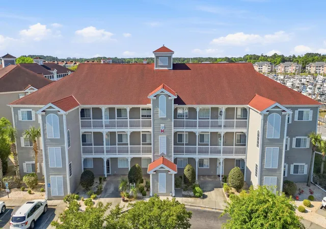 Photo 1 of Condo for sale at 4200 Coquina Harbour Dr #H12, Little River, SC 29566 | MLS# 2610087 | Listing updated on 2026-07-28