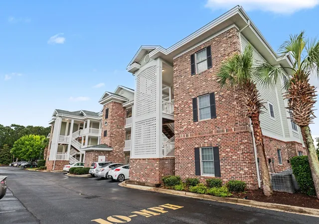 Listing Photo 1 - Condo for sale in building located at 4869 Magnolia Pointe Ln, Myrtle Beach, SC 29577 - Unit #205