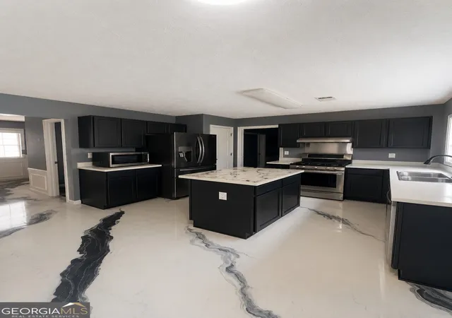 Photo 2 of Single family home for sale at 124 Heathrow Dr, Riverdale, GA 30274 | MLS# 10817397 | Listing updated on 2026-09-12