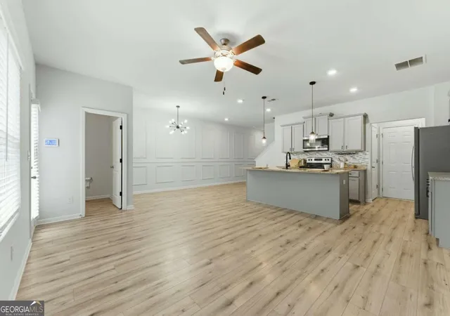 Photo 3 of Townhouse for sale at 7492 Knoll Holw Rd, Lithonia, GA 30058 | MLS# 10788849 | Listing updated on 2026-07-03