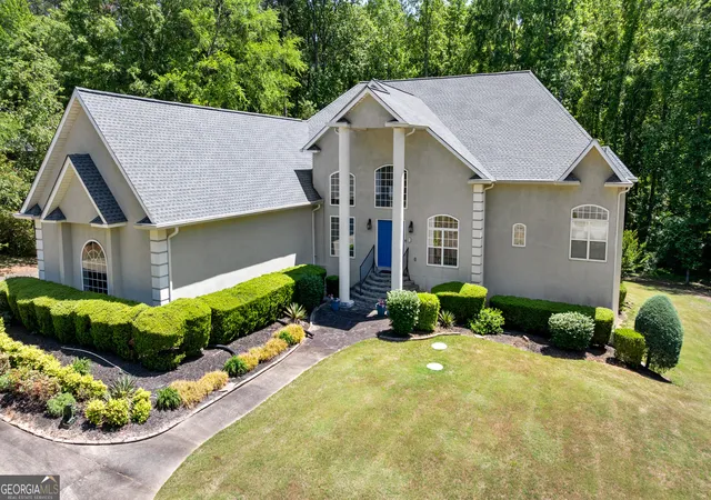 Photo 2 of Single family home for sale at 915 Magnolia Way, Hampton, GA 30228 | MLS# 10757503 | Listing updated on 2026-08-01