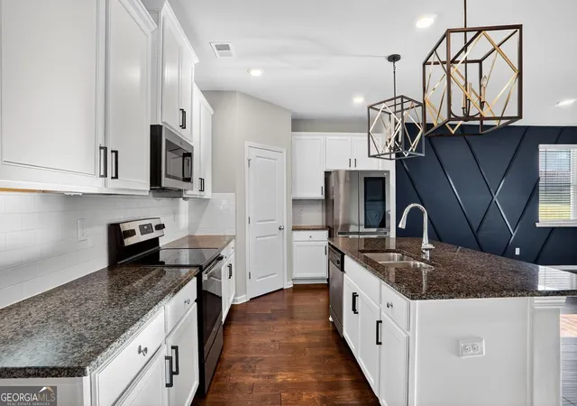 Photo 3 of Single family home for sale at 1553 Spring Hollow Wy, Stone Mountain, GA 30083 | MLS# 10828661 | Listing updated on 2026-10-08