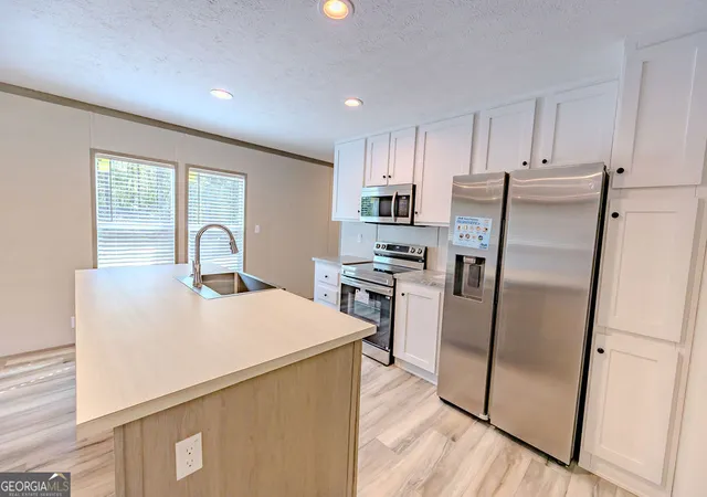 Photo 4 of Manufactured home for sale at 950 Collins Lane, Rentz, GA 31075 | MLS# 10827070 | Listing updated on 2026-09-17