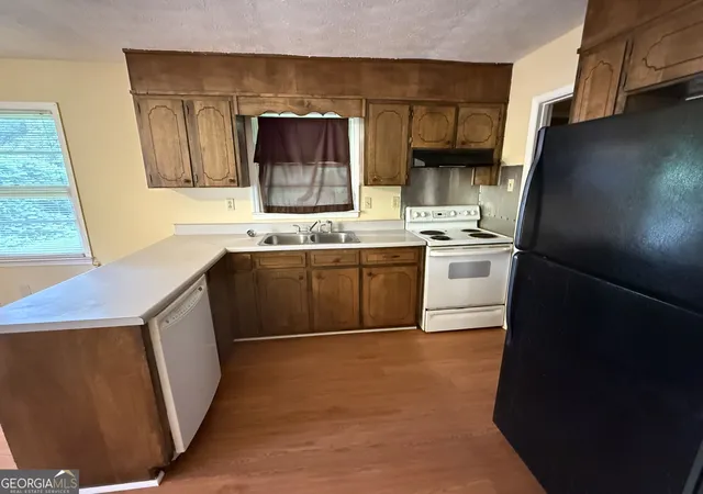 Photo 3 of Single family home for sale at 6988 Fielder Rd, Rex, GA 30273 | MLS# 10824047 | Listing updated on 2026-09-04