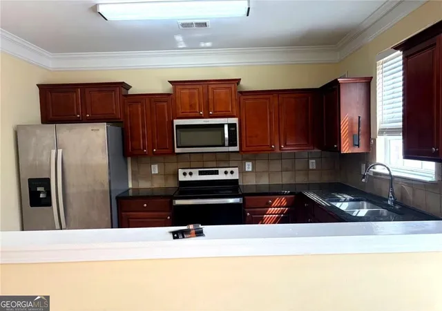Photo 4 of Townhouse for sale at 6282 Spring Knoll Ct, Tucker, GA 30084 | MLS# 10705826 | Listing updated on 2026-07-05