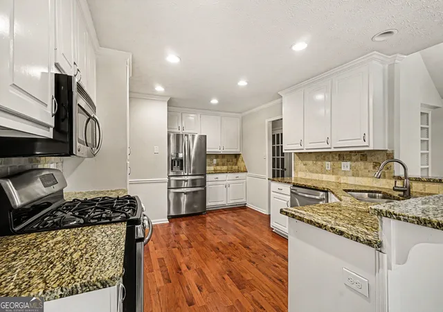 Photo 2 of Sale Pending at 977 Sunny Glenn Ct, Lawrenceville, GA 30043 | MLS# 10771374 | Listing updated on 2026-07-09