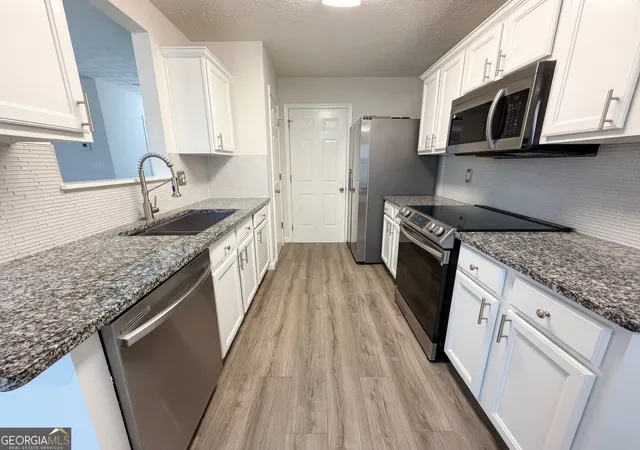 Photo 2 of Townhouse for sale at 258 Alcovy Walk Dr, Lawrenceville, GA 30045 | MLS# 10721152 | Listing updated on 2026-09-20