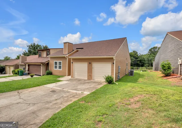 Photo 2 of Townhouse for sale at 1541 Burnstone Dr, Stone Mountain, GA 30088 | MLS# 10816893 | Listing updated on 2026-09-04