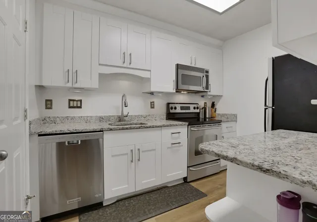 Photo 3 of Condo for sale at 3843 Woodridge Way, Tucker, GA 30084 | MLS# 10815786 | Listing updated on 2026-09-10