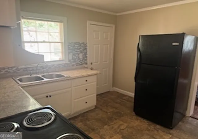 Photo 4 of Single family home for sale at 5161 Phillips Dr, Forest Park, GA 30297 | MLS# 10819025 | Listing updated on 2026-09-04